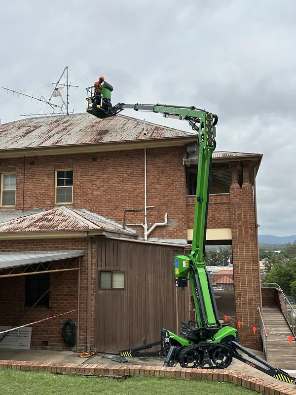 Leguan 190 EWP at full 19m working height — large aerial mast removal